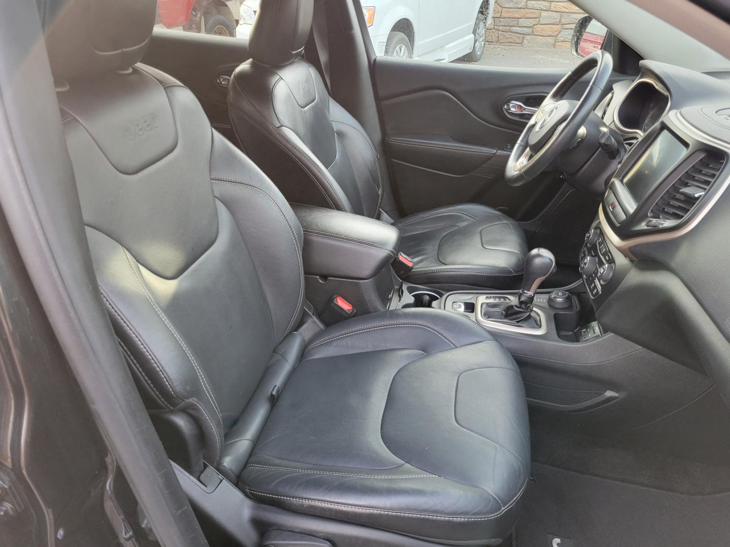 2015 Black /Black Jeep Cherokee Limited (1C4PJMDS4FW) with an 3.2L V6 engine, Automatic transmission, located at 450 N Russell, Missoula, MT, 59801, (406) 543-6600, 46.874496, -114.017433 - Nice Jeep. Lots of Features. 4 Wheel Drive. Automatic. Huge Sunroof. Leather Heated Seats. Power Drivers Seat. Heated Steering Wheel. Bluetooth. Steering Wheel Controls. Air. Cruise. Tilt. Power Windows and Locks. Towing. - Photo#10